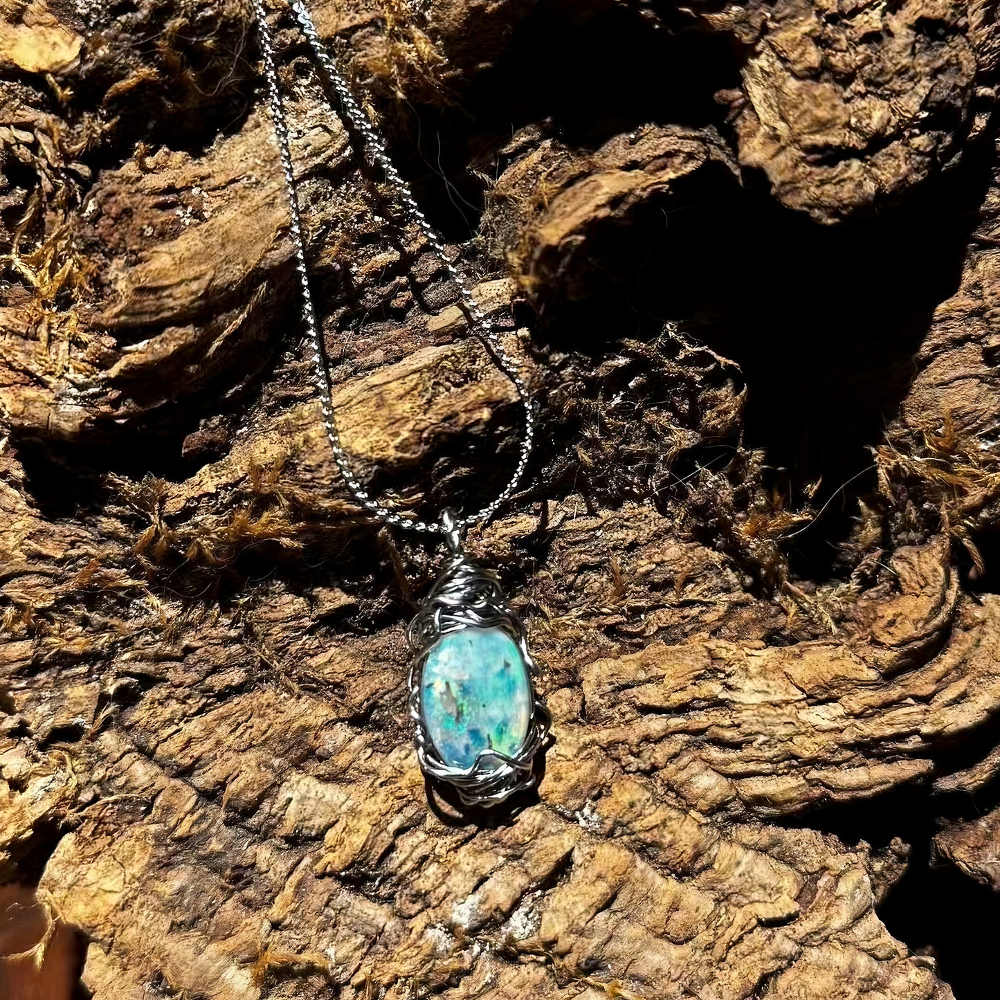 The Energy of Mother-of-Pebble Opal Mini Steel Pendant Necklace